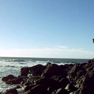 Relief rocks coast clouds HD wallpaper