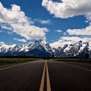 Empty road clouds mountains HD wallpaper