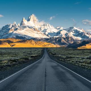 Empty road clouds mountains HD wallpaper
