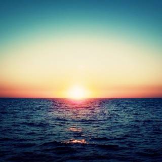 Sunset over the ocean wallpaper