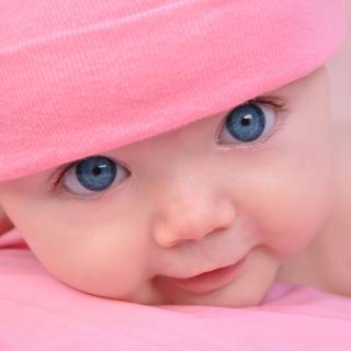 New born baby with women wallpaper