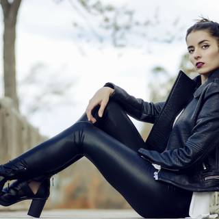 Girl wearing leather jacket wallpaper