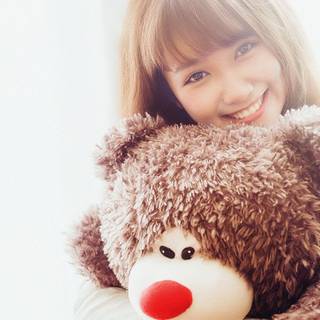 Teddy Bear with girl wallpaper