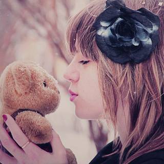 Teddy Bear with girl wallpaper