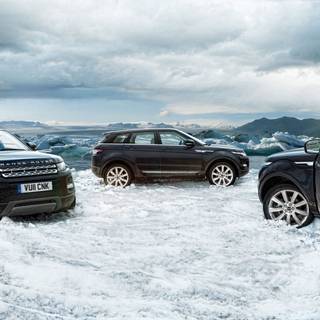 Cars in snow wallpaper