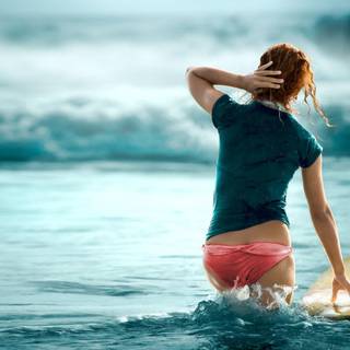Surfing girl wallpaper