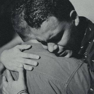 Couple cuddling wallpaper