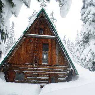 Small winter cabin wallpaper