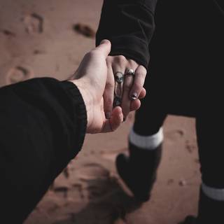 Couples hands wallpaper
