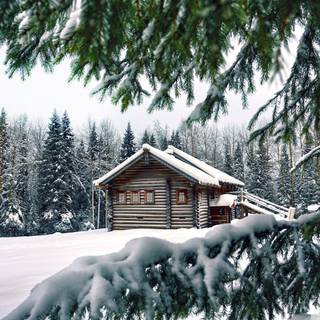 Winter alpine cabin wallpaper