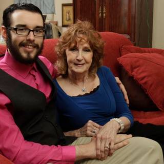 Old women kiss child wallpaper