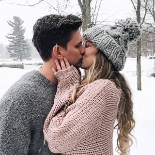 Winter couple poses wallpaper