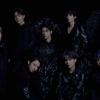 BTS members with logo wallpaper