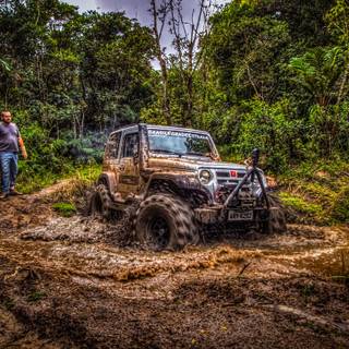 Trucks in mud wallpaper