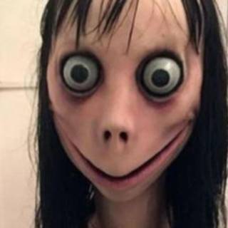 Creepy Momo wallpaper