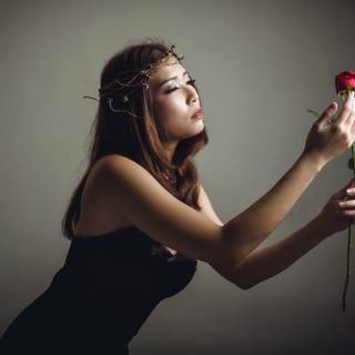 Women with rose wallpaper