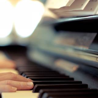 Women playing piano wallpaper