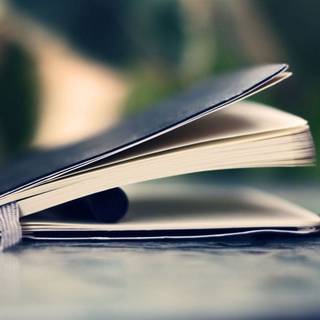 Book and pen wallpaper