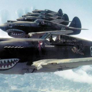 Fighter plane shark teeth wallpaper