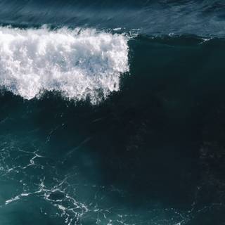 Aerial view ocean waves wallpaper