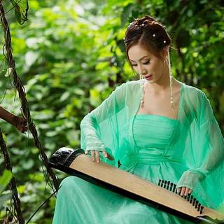 Asian girl playing the zither