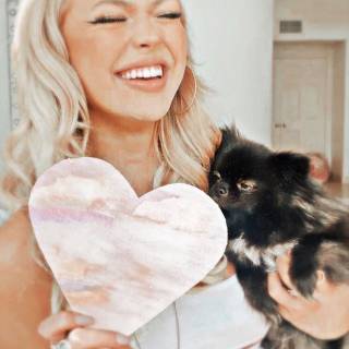 she is so sexy cute girl in the world who heart is that and the cute dog