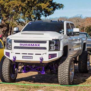white and purple truck
