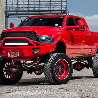 red and black ram truck