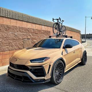 i love this fast lamborghini truck and a bike on top of it