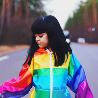 girl in rainbow clothes