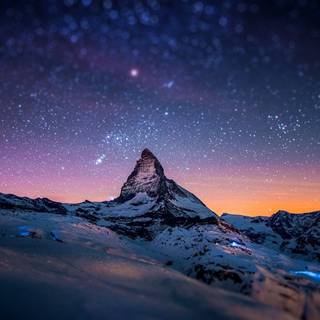 Mount Everest in the night sky wallpaper