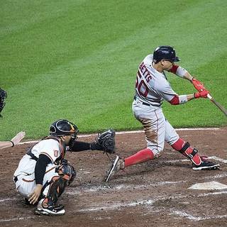 mookie betts hitting a home run
