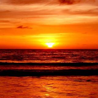 sunset on the beach 4k wallpaper