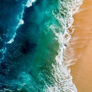 Waves on the beach 4k wallpaper