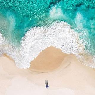 Waves on the beach 4k wallpaper