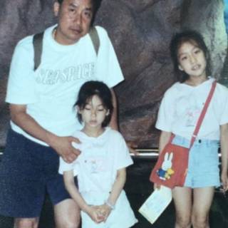 My best friend baozhia and her little sister and her dad they was so young 