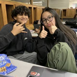 I got my little bad ass sister and her boyfriend out school Friday 