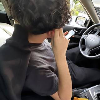 My husband driving me and my cute son around 