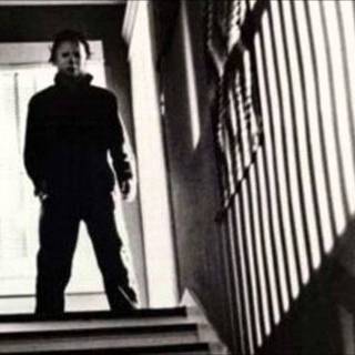 Michael Myers Standing at The Top of Your Basement Stairs