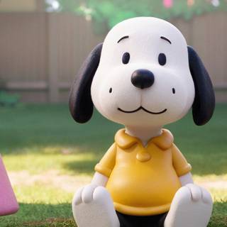 Snoopy from charlie brown in a yellow shirt