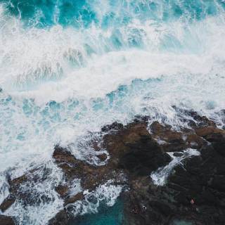 Waves Against the Rocks