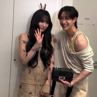 Bang Chan and Mina 
