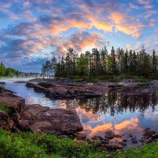 Morning golden hour moment on a small lake in Finland 