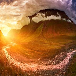 Sunset In Middle Of Two Brown Mountains