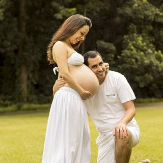My wife and I touching the baby bump shes pregnant guys 