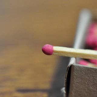 Wooden matches with red sulfur heads