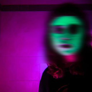 sad girl in pink light