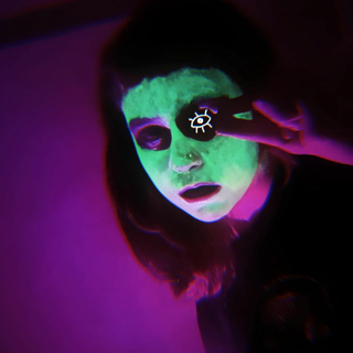 sad girl in pink light