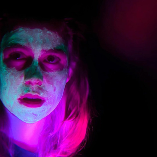 sad girl in pink light