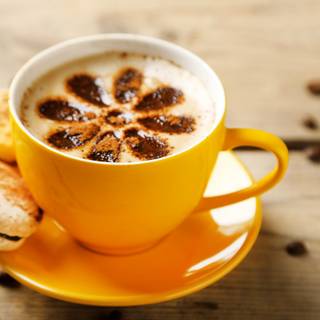 yellow cup of coffee